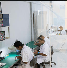 Wickramarachchi Hearing Care modern cleanroom laboratory environment with acoustic calibration hardware